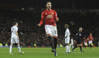 Manchester United&#x27;s Henrikh Mkhitaryan celebrates after scoring his side&#x27;s third goal during the English Premier League soccer match between Manchester United and Sunderland at Old Trafford in Manchester, England, Monday, Dec. 26, 2016. (AP Photo/Rui Vieira)