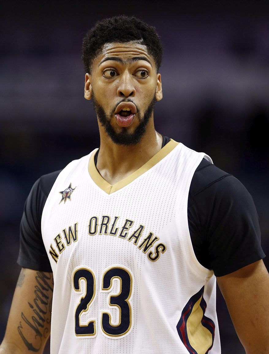 New Orleans Pelicans forward Anthony Davis reacts to a call while playing the Dallas Mavericks in the second half of an NBA basketball game in New Orleans, Monday, Dec. 26, 2016. The Pelicans won 111-104. (AP Photo/Tyler Kaufman)
