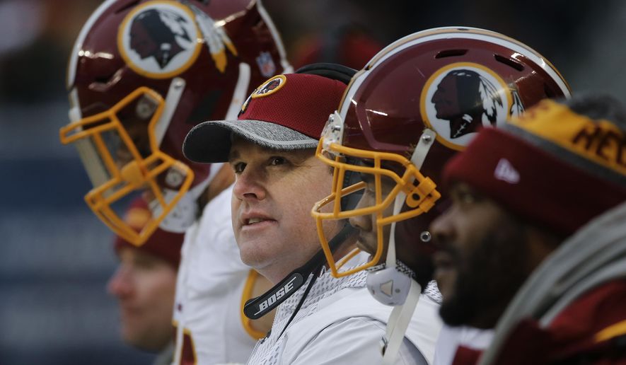 Washington Redskins head coach Jay Gruden watches during the second half of an NFL football game against the Chicago Bears, Saturday, Dec. 24, 2016, in Chicago. (AP Photo/Charles Rex Arbogast) **FILE**