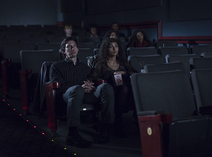 This image released by Amazon Studios & Bleecker Street shows Adam Driver, left, and Golshifteh Farahani in a scene from, "Paterson." (Mary Cybulsky/Amazon Studios & Bleecker Street via AP)