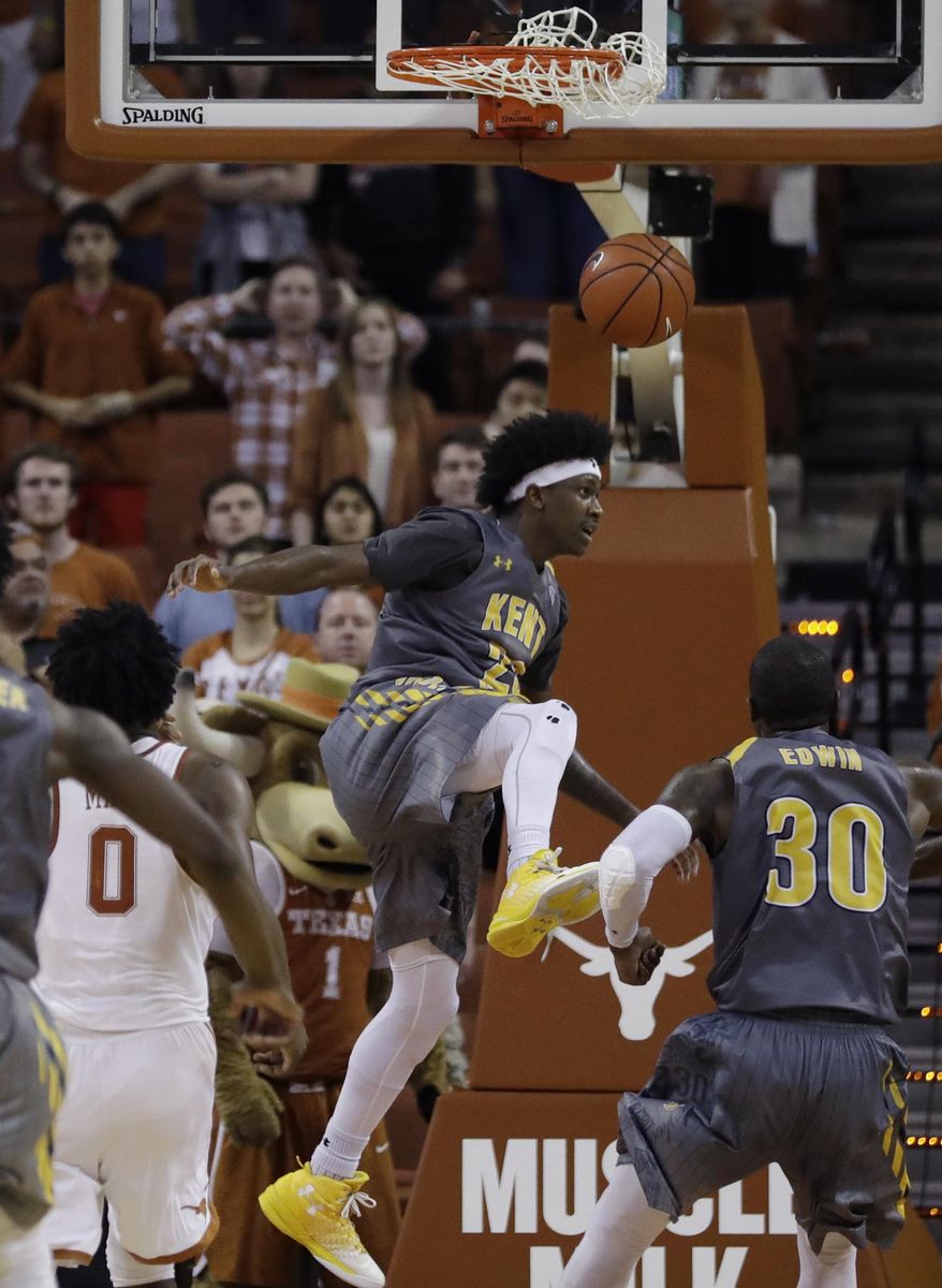 Kent State guard Jaylin Walker (23) scores against Texas during the second half of an NCAA college basketball game, Tuesday, Dec. 27, 2016, in Austin, Texas. Kent State won 63-58. (AP Photo/Eric Gay)