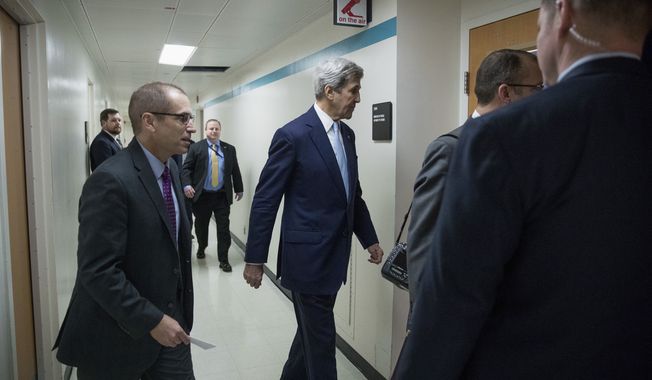 Secretary of State John Kerry walks into an interview after speaking at the State Department in Washington, Wednesday, Dec. 28, 2016. Stepping into a raging diplomatic argument, Kerry staunchly defended the Obama administration&#x27;s decision to allow the U.N. Security Council to declare Israeli settlements illegal and warned that Israel&#x27;s very future as a democracy is at stake. (AP Photo/Andrew Harnik)