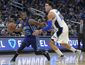 hornets_magic_basketball_56588.jpg