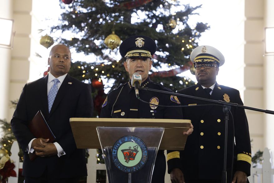 Pasadena Police Chief Phillip Sanchez, center, speaks about safety issues ahead of next week&#x27;s 128th Rose Parade as he is joined by Pasadena Fire Chief Bertral Washington, background right, and Rob Savage, special agent in charge of the U.S. Secret Service Wednesday, Dec. 28, 2016, in Pasadena, Calif. (AP Photo/Jae C. Hong)
