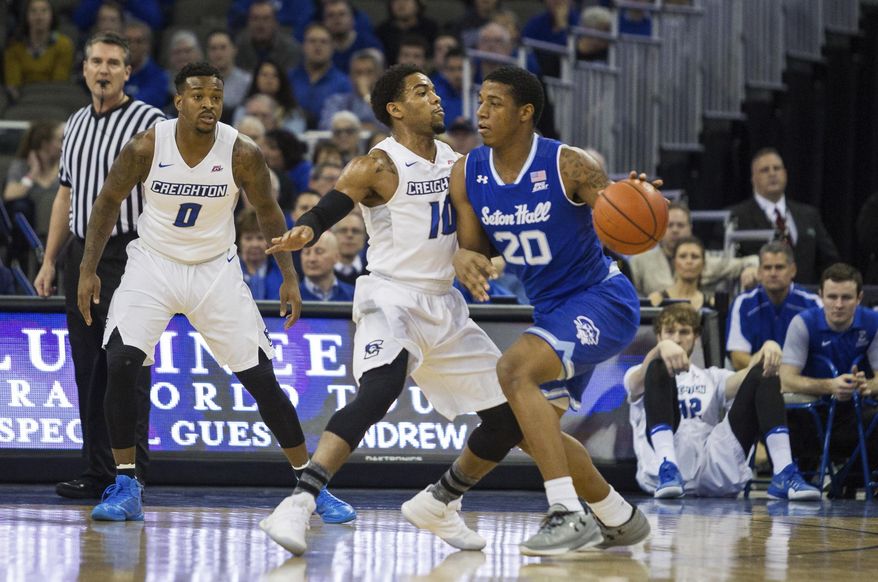 Creighton guard Maurice Watson Jr. (10) guards Seton Hall forward Desi Rodriguez (20) during the first half of an NCAA college basketball game in Omaha, Neb., Wednesday, Dec. 28, 2016. (AP Photo/John Peterson)