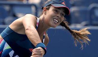 FILE - In this Tuesday, Aug. 30, 2016 file photo, Ana Ivanovic of Serbia serves to Denisa Allertova of the Czech Republic, during the first round of the U.S. Open tennis tournament in New York. Ana Ivanovic is retiring from tennis at age 29, ending a career in which she was ranked No. 1 in 2008 but can no longer play at the highest level because of injuries. In a live broadcast on Facebook, Ivanovic said Wednesday, Dec. 28, “it was a difficult decision, but there is so much to celebrate.” The Serb won 15 tour titles, including the 2008 French Open. (AP Photo/Alex Brandon, file)