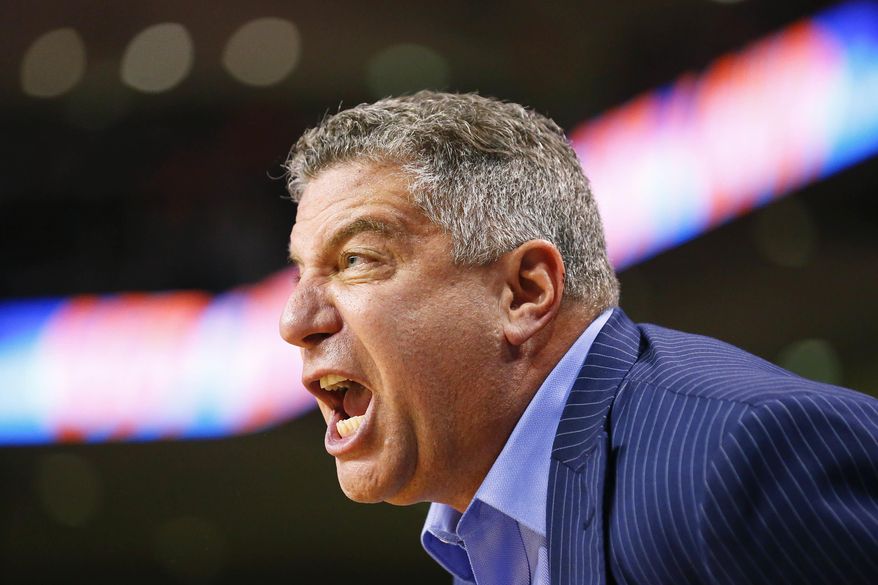 Auburn head coach Bruce Pearl yells towards his players to be aggressive during the second half of an NCAA college basketball game, Thursday, Dec. 29, 2016, in Auburn, Ala. Georgia won 96-84. (AP Photo/Brynn Anderson)