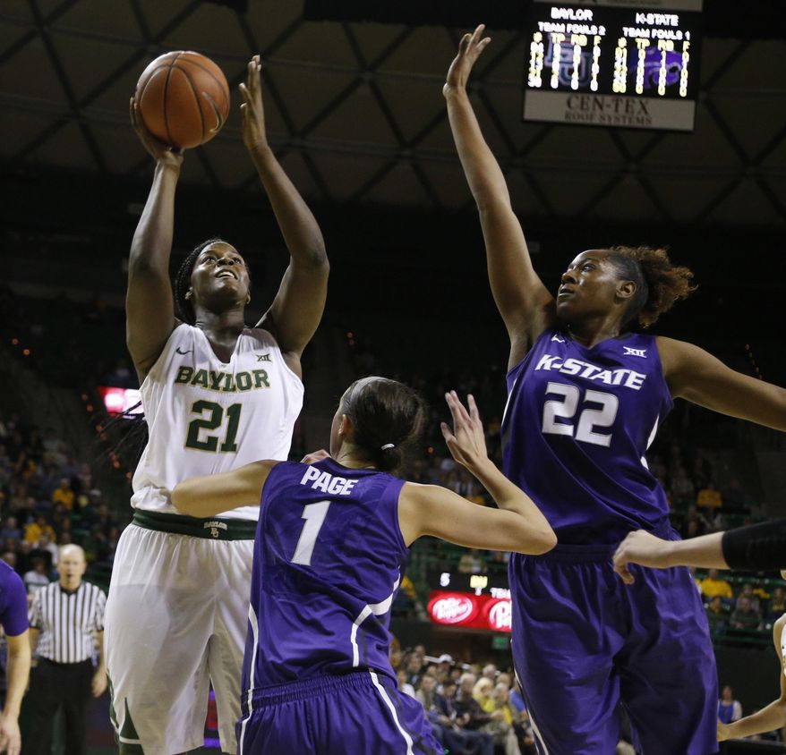 Baylor center Kalani Brown (21) shoots over Kansas State forwards Kaylee Page and Breanna Lewis, right, during the first half of an NCAA college basketball game, Thursday, Dec. 29, 2016, in Waco, Texas. (AP Photo/Rod Aydelotte)