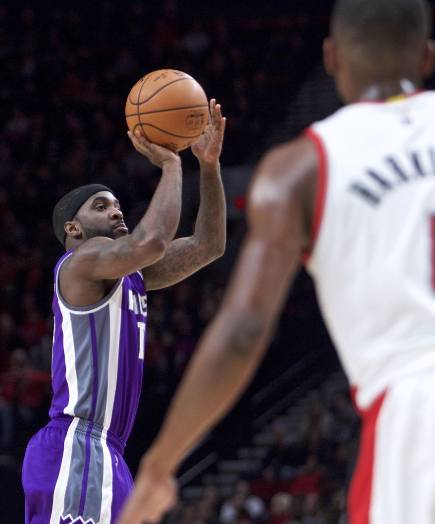 Sacramento Kings guard Ty Lawson shoots against the Portland Trail Blazers during the first half of an NBA basketball game in Portland, Ore., Wednesday, Dec. 28, 2016. (AP Photo/Craig Mitchelldyer)