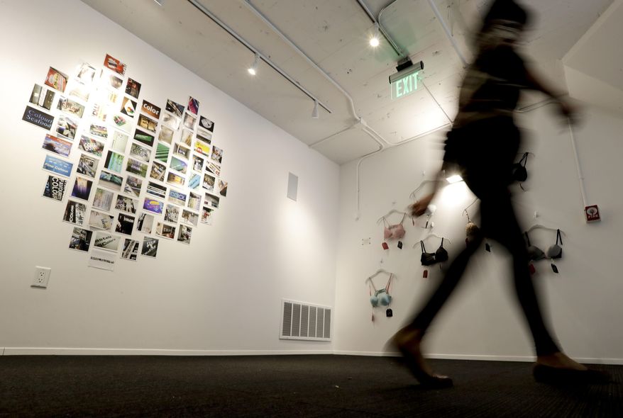 A visitor tours the new Museum of Broken Relationships Wednesday, Dec. 28, 2016, in Los Angeles. The museum displays artifacts from failed unions, most of them mundane under ordinary circumstances. (AP Photo/Chris Carlson)