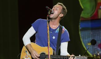 n this Sept. 4, 2016, file photo, Chris Martin of Coldplay performs at The Budweiser Made In America Festival in Philadelphia. (Photo by Michael Zorn/Invision/AP, File)