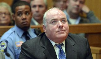 FILE - In this Thursday, Nov. 21, 2013, file photo, Michael Skakel reacts to being granted bail during his bond hearing at Stamford Superior Court in Stamford, Conn. A divided Connecticut Supreme Court on Friday, Dec. 30, 2016, reinstated Kennedy cousin Skakel&#39;s murder conviction in the 1975 killing of Martha Moxley, rejecting a lower court ruling in an appeal that his trial lawyer didn&#39;t adequately represent him. (Bob Luckey/Hearst Connecticut Media via AP, Pool, File)