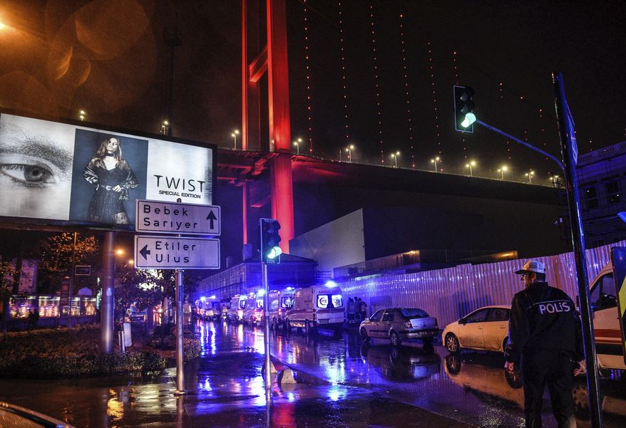 Ambulances rush on the scene of an attack in Istanbul, early Sunday, Jan. 1, 2017. Private NTV television said more than one assailant may have been involved in the attack. The attacker or attackers are believed to have entered the nightclub in Istanbul&#39;s Ortakoy district disguised as Santa Claus, the station reported. (AP Photo)