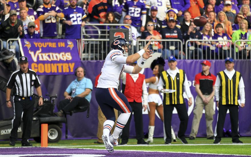 Chicago Bears quarterback Matt Barkley catches a 2-yard touchdown pass during the first half of an NFL football game against the Minnesota Vikings on Sunday, Jan. 1, 2017, in Minneapolis. (AP Photo/Andy Clayton-King)