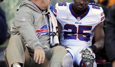 Buffalo Bills running back LeSean McCoy, right, is taken to the locker room on a cart during the first half of an NFL football game against the New York Jets, Sunday, Jan. 1, 2017, in East Rutherford, N.J. (AP Photo/Seth Wenig)