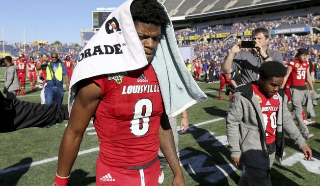 Louisville quarterback Lamar Jackson leaves the field after the team's 29-9 loss to LSU in the Citrus Bowl NCAA college football game in Orlando, Fla., Saturday, Dec. 31, 2016. (Joe Burbank/Orlando Sentinel via AP)