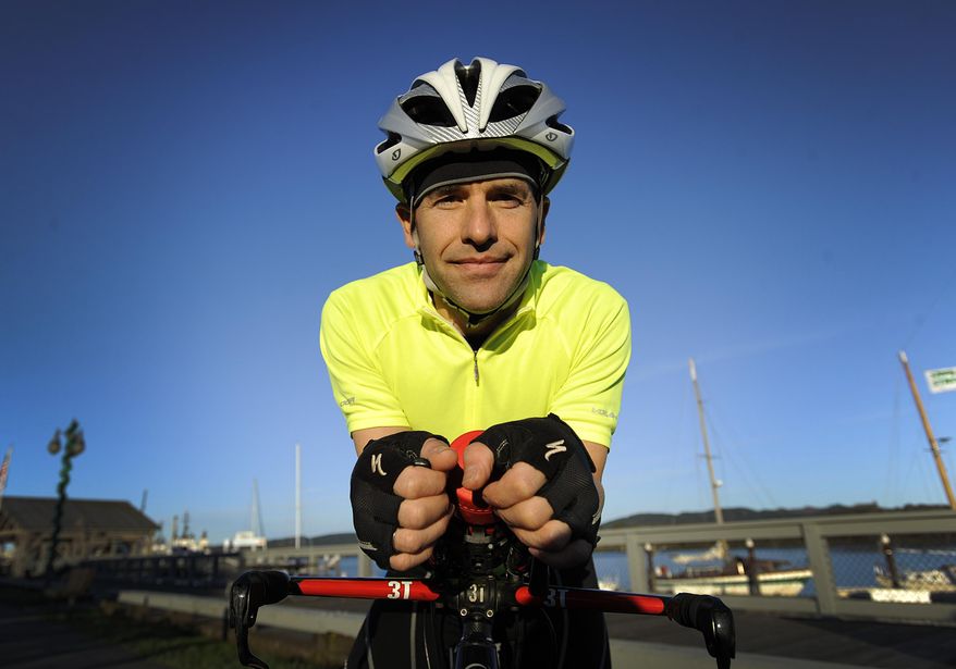 ADVANCE FOR THE WEEKEND OF DEC. 30-JAN 1 AND THEREAFTER - In a Dec. 21, 2016 photo, Robert Lounsbury, an Ironman triathlete, poses for a photo in Coos Bay. Lounsbury continues to train for competitions after recovering from a bike accident left him with a concussion and several broken bones. (Bethany Baker/The World via AP)