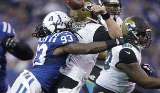 Indianapolis Colts linebacker Erik Walden (93) forces a fumble as he sacks Jacksonville Jaguars quarterback Blake Bortles (5) during the first half of an NFL football game in Indianapolis, Sunday, Jan. 1, 2017. The Colts recovered the fumble. (AP Photo/AJ Mast)
