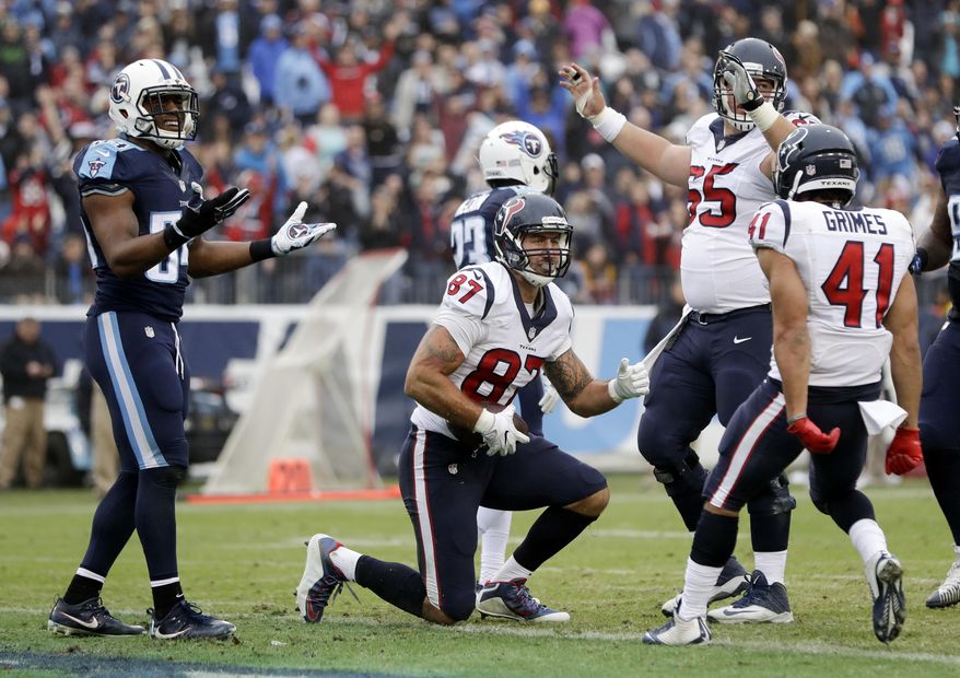 Houston Texans tight end C.J. Fiedorowicz (87) gets up after scoring a touchdown on a 4-yard pass reception against the Tennessee Titans in the second half of an NFL football game Sunday, Jan. 1, 2017, in Nashville, Tenn. (AP Photo/James Kenney)