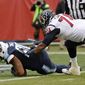 Tennessee Titans defensive lineman DaQuan Jones, left, recovers a Houston Texans fumble in the end zone for a touchdown ahead of Houston Texans tackle Chris Clark (74) in the first half of an NFL football game Sunday, Jan. 1, 2017, in Nashville, Tenn. (AP Photo/Mark Zaleski)