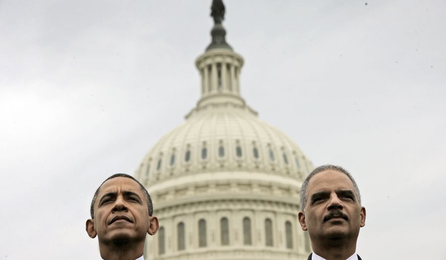 In this May 15, 2013, file photo, President Barack Obama sits with Attorney General Eric Holder during the 32nd annual the National Peace Officers Memorial Service on Capitol Hill in Washington. Obama has announced plans to improve Democrats down-ballot fortunes once he leaves office. He is launching an initiative with former Attorney General Eric Holder aimed at making Democratic gains when states redraw legislative district lines following the 2020 census. (AP Photo/Pablo Martinez Monsivais)