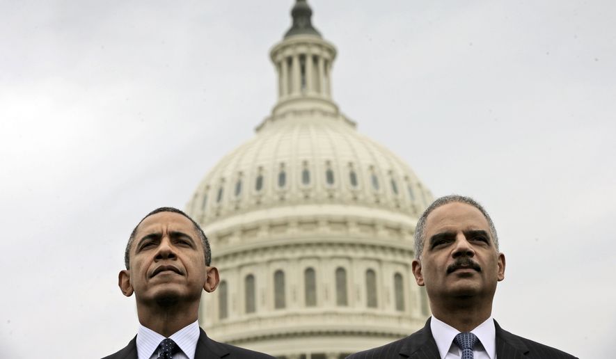 In this May 15, 2013, photo, President Barack Obama sits with Attorney General Eric Holder during the 32nd annual the National Peace Officers Memorial Service on Capitol Hill in Washington. (AP Photo/Pablo Martinez Monsivais) **FILE**