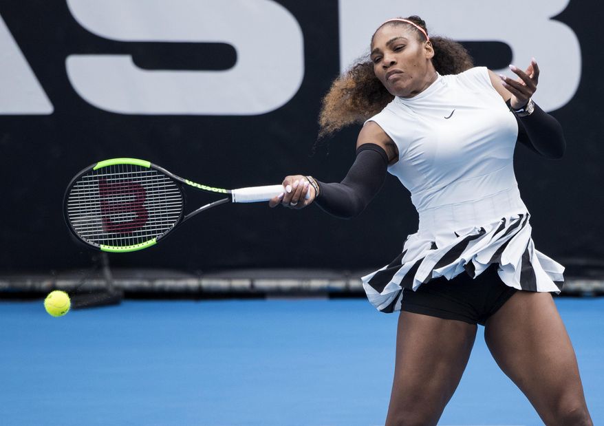 United States&#x27; Serena Williams hits a forehand during her first round match against Pauline Parmentier of France at the ASB Classic tennis tournament in Auckland, New Zealand, Tuesday, Jan 3, 2017. Williams won in straight sets 6-3, 6-4. (Jason Oxenham/New Zealand Herald via AP)
