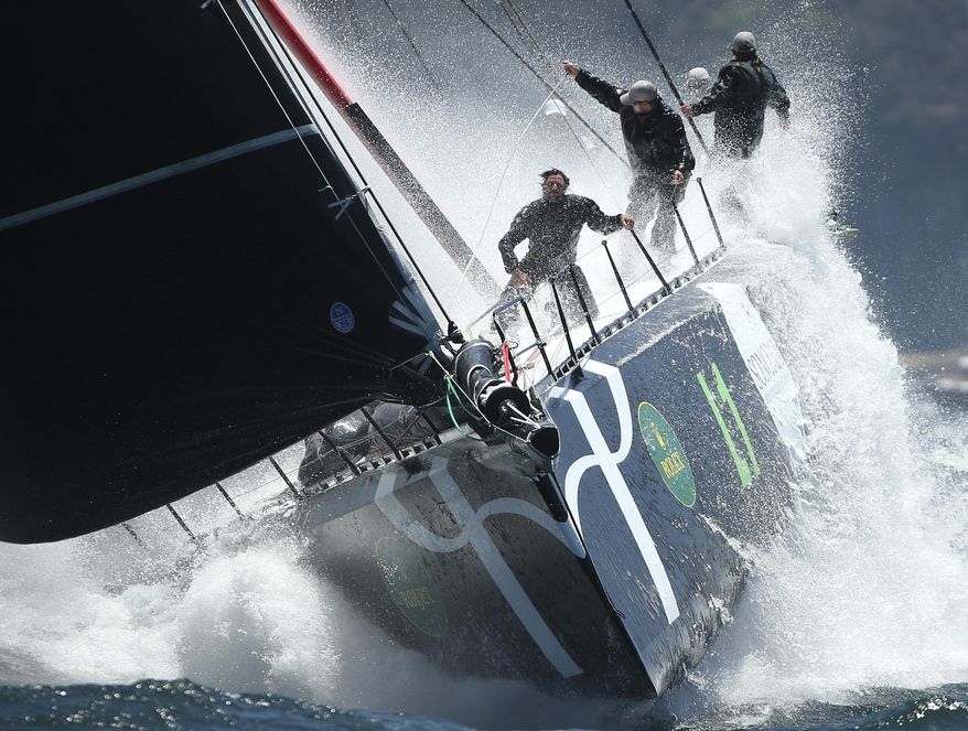 In this Monday, Dec. 26, 2016 photo, the yacht Loyal makes its way through the heads during the start of the Sydney Hobart yacht race in Sydney, Australia. The 88 yachts started in the annual 628-nautical mile race to Australia's island state of Tasmania. (AP Photo/Rick Rycroft, File)