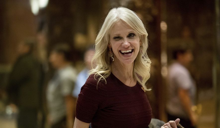 Kellyanne Conway, President-elect Donald Trump&#39;s campaign manager, winks as she answers a question from a member of the media as she leaves Trump Tower, in New York, Tuesday, Jan. 3, 2017. (AP Photo/Andrew Harnik) ** FILE **