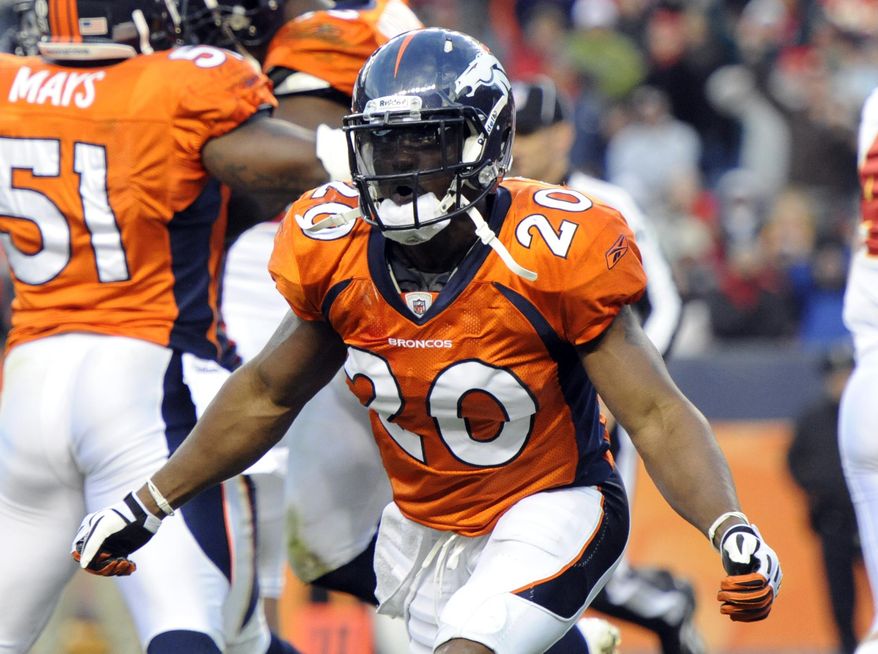 FILE - In this Sunday, Nov. 14, 2010 file photo, Denver Broncos safety Brian Dawkins celebrates a goal line stand against the Kansas City Chiefs during an NFL football game in Denver. Dawkins is a finalists for the Pro Football Hall of Fame’s Class of 2017, the Hall announced Tuesday, Jan. 3, 2017. (AP Photo/Jack Dempsey, File)