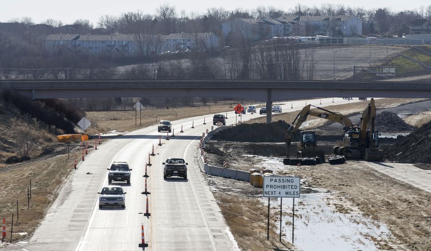 In a Monday, Dec 26, 2016 photo, traffic is reduced to two lanes on Highway 75 for construction, in Omaha, Neb. Residents just south of Omaha are concerned that a highway project from Bellevue to Plattsmouth will create long-lasting issues. (Matt Dixon/The World-Herald via AP)
