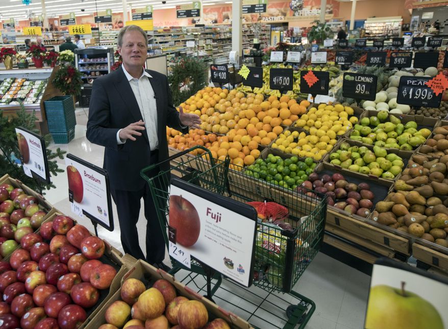 In this Tuesday, Dec. 6, 2016 photo, Brian Wansink, a food behavior scientist at Cornell University, speaks during an interview in the produce section at a supermarket in Ithaca, N.Y. In a study of 1,200 shoppers, every minute spent in the produce section meant $1.80 more in fruit and vegetable sales. (AP Photo/Mike Groll)
