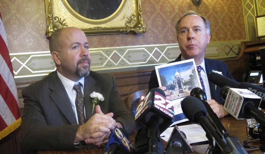 Wisconsin Assembly Speaker Robin Vos, right, and Assembly Majority Leader Jim Steineke, left, say supporters of hot-button issues like allowing the carrying of concealed weapons on college campuses need to generate public support before bringing them forward in the legislative session that began Tuesday, Jan. 3, 2017, in Madison, Wis. (AP Photo/Scott Bauer)