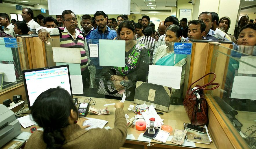 Indians deposited discontinued notes on the last day in a bank in Gauhati, India. Prime Minister Narendra Modi yanked most of its currency bills from circulation without warning, delivering a jolt to the country&#39;s high-performing economy and leaving countless citizens scrambling for cash. (Associated Press)
