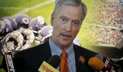 Chicago Bears chairman George H. McCaskey talks to reporters after an end of season NFL football news conference with coach John Fox and general manager Ryan Pace Wednesday, Jan. 4, 2017, in Lake Forest, Ill. (AP Photo/Charles Rex Arbogast)