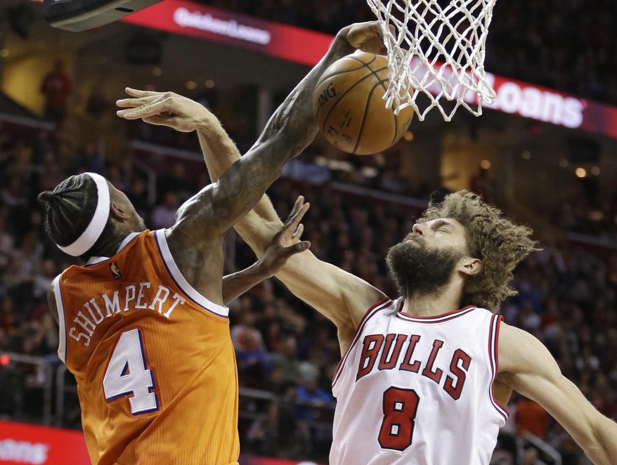 Chicago Bulls' Robin Lopez (8) fouls Cleveland Cavaliers' Iman Shumpert (4) in the first half of an NBA basketball game, Wednesday, Jan. 4, 2017, in Cleveland. (AP Photo/Tony Dejak)