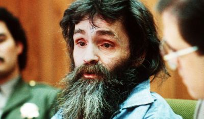 FILE - In this 1986 file photo, Charles Manson is seen in court. Amid reports that Charles Manson has been taken from his California prison cell to a hospital, a state corrections official would confirm only that the 82-year-old killer and cult leader was still alive. Both TMZ and the Los Angeles Times reported Tuesday, Jan. 3, 2017 that Manson had been hospitalized. (AP Photo/File)