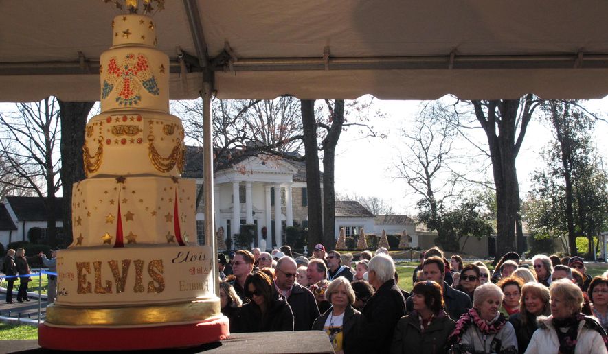 In this Tuesday, Jan. 8, 2013, photo, fans of Elvis Presley attend a birthday celebration and cake-cutting on what would have been the late rock and roll icon's 78th birthday, at Graceland on in Memphis, Tenn. Events begin Thursday, Jan. 5, 2017, in Memphis, to mark what would have been Elvis Presley’s 82nd birthday, with a cake-cutting ceremony on the front lawn of his home at Graceland. (AP Photo/Adrian Sainz, File)