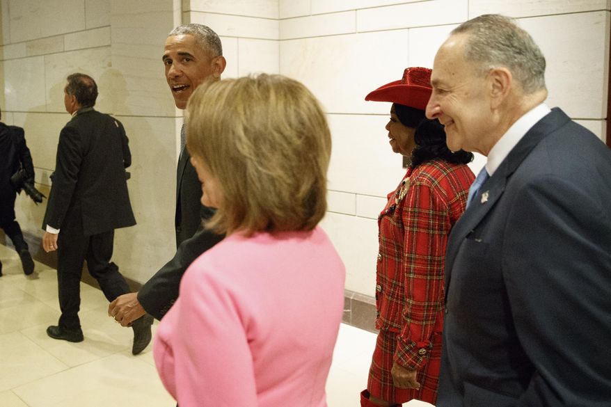 President Barack Obama arrives on Capitol Hill in Washington, Wednesday, Jan. 4, 2017, to meet with members of Congress to discuss his signature healthcare law. From left are, the president, House Minority Leader Nancy Pelosi of Calif. Rep. Frederica Wilson, D-Fla., and Senate Minority Leader Charles Schumer of N.Y. (AP Photo/Evan Vucci)