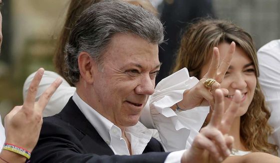 President Juan Manuel Santos won the Nobel Peace Prize for his efforts to halt the country&#39;s long civil war, but Colombians still distrust his peace treaty with the FARC rebels. (Associated Press)