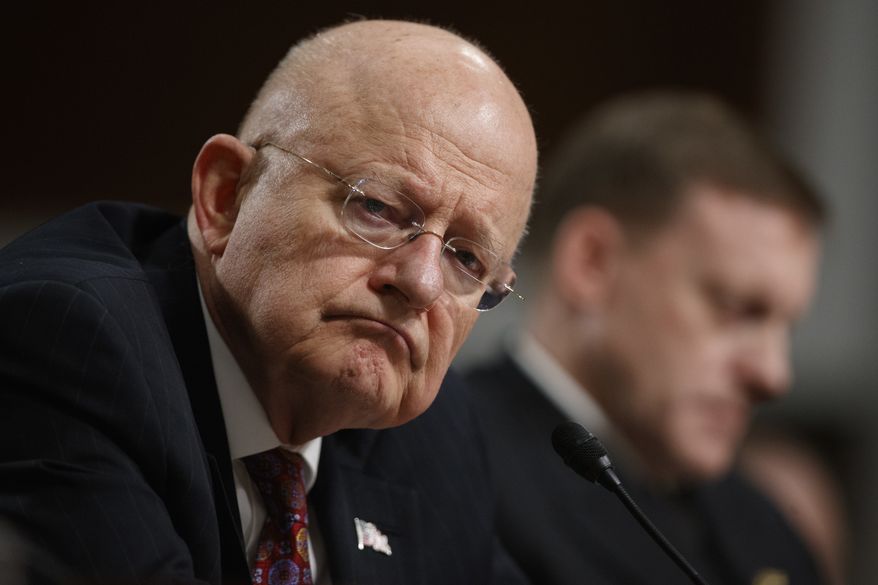 Director of National Intelligence James R. Clapper and National Security Adviser Adm. Michael Rogers testified Thursday before the Senate Armed Services Committee hearing &quot;Foreign Cyber Threats to the United States.&quot; (Associated Press)