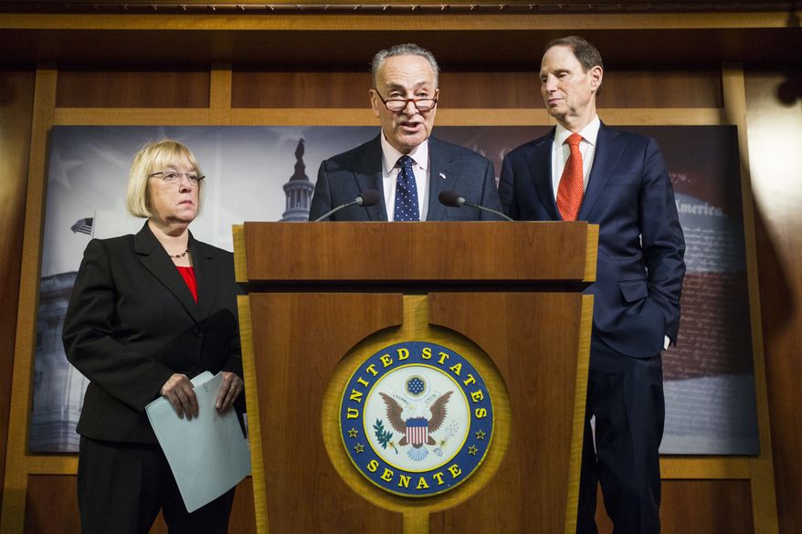 Senate Minority Leader Charles Schumer of N.Y., flanked by Sen. Patty Murray, D-Wash., left, and Sen. Ron Wyden, D-Ore., speaks during a news conference on Capitol Hill in Washington, Thursday, Jan. 5, 2017, to discuss the nomination of Rep. Tom Price, R-Ga. to become Health and Human Services secretary. (AP Photo/Zach Gibson)