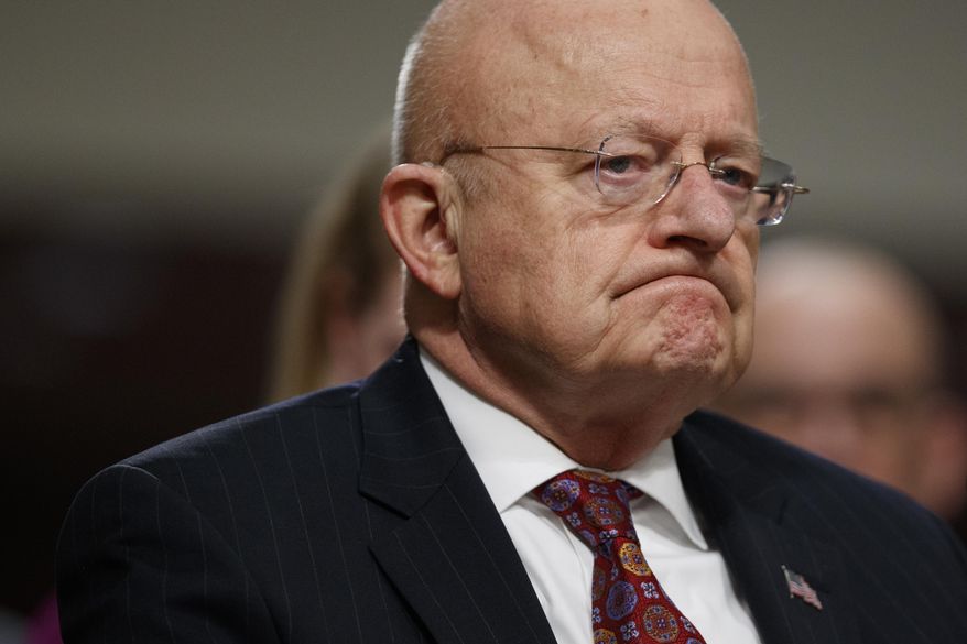 Director of National Intelligence James Clapper listens while testifying on Capitol Hill in Washington, Thursday, Jan. 5, 2017, before the Senate Armed Services Committee hearing: "Foreign Cyber Threats to the United States." (AP Photo/Evan Vucci)