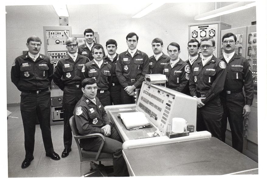 In this undated photo, Allan Childers, second right, poses with others on a Titan II missile crew at Damascus, Ark. Childers was deputy commander of the crew in 1980, when an airman performing maintenance in the missile silo dropped a socket that pierced the rocket’s fuel tank. The accident triggered an explosion 10 hours later, throwing a 9-megaton nuclear warhead into a ditch 200 yards away. PBS’ American Experience series will show the documentary “Command and Control” on Tuesday, Jan. 10, 2017. (AP Photo/US Air Force via American Experience-WGBH)