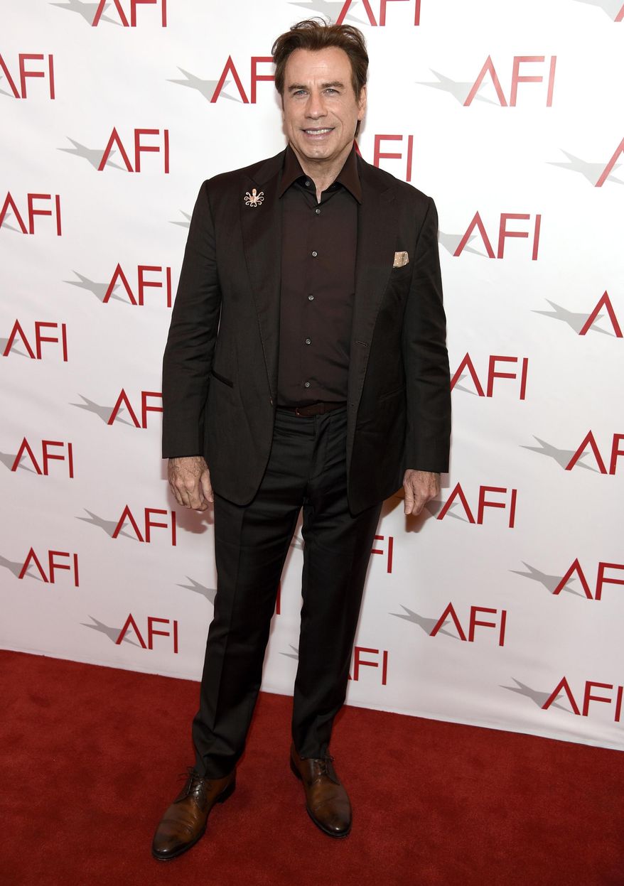John Travolta arrives at the AFI Awards at the Four Seasons Hotel on Friday, Jan. 6, 2017, in Los Angeles. (Photo by Chris Pizzello/Invision/AP)