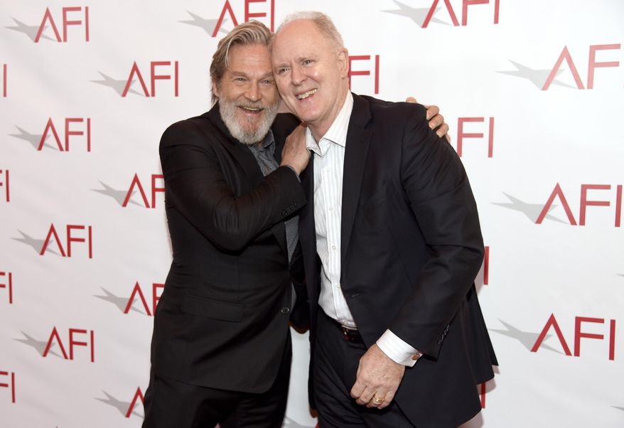Jeff Bridges, left, and John Lithgow arrive at the AFI Awards at the Four Seasons Hotel on Friday, Jan. 6, 2017, in Los Angeles. (Photo by Chris Pizzello/Invision/AP)