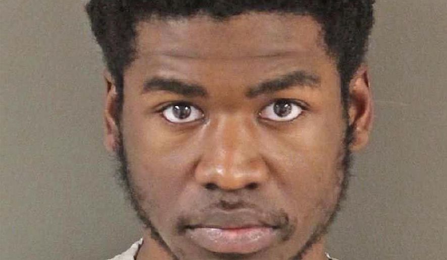 FILE – This undated photo provided by the Franklin County Sheriff's Office in Columbus, Ohio, shows Aaron Travis Daniels. Ohio resident Aaron T. Daniels, accused of trying to travel to Libya to join the Islamic State group, was taken into custody Nov. 7, 2016, at John Glenn Columbus International Airport in Columbus, Ohio, and has pleaded not guilty to terrorism-related charges. In a Thursday, Jan. 5, 2017, court filing, federal prosecutors asked a judge to appoint a security officer to handle classified information filings in Daniels' case. (Franklin County Sheriff's Office via AP, File)