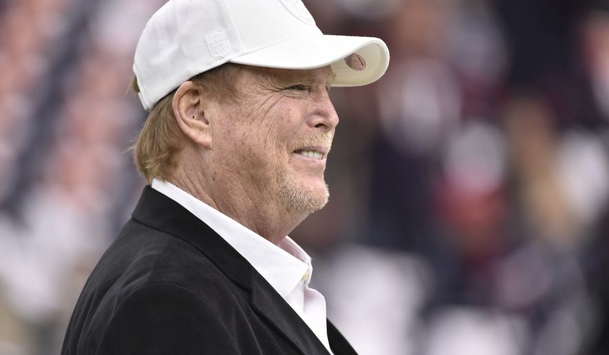 Raiders owner Mark Davis watches teams warm up before the first half of an AFC Wild Card NFL game between the Houston Texans and the Oakland Raiders, Saturday, Jan. 7, 2017, in Houston. (AP Photo/Eric Christian Smith)