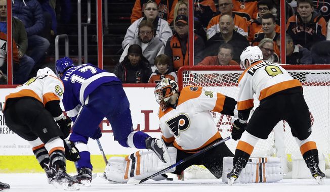 Tampa Bay Lightning&#x27;s Alex Killorn (17) scores a goal past Philadelphia Flyers&#x27; Michal Neuvirth (30) as Andrew MacDonald (47) and Ivan Provorov (9) defend during the second period of an NHL hockey game, Saturday, Jan. 7, 2017, in Philadelphia. (AP Photo/Matt Slocum)