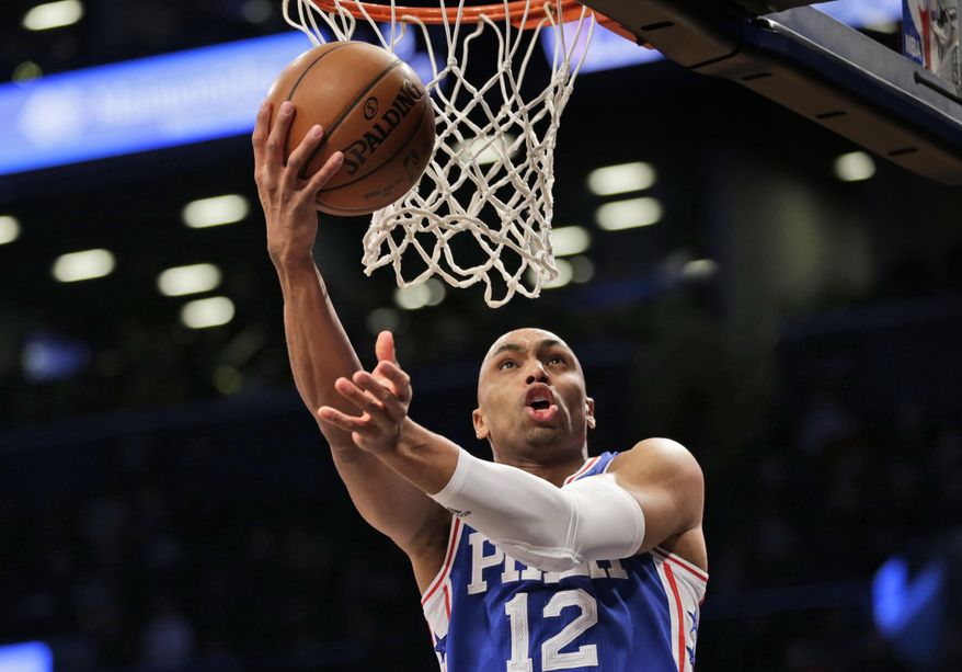Philadelphia 76ers' Gerald Henderson takes the ball to the hoop during the first half of the NBA basketball game against the Brooklyn Nets at the Barclays Center, Sunday, Jan. 8, 2017, in New York. (AP Photo/Seth Wenig)